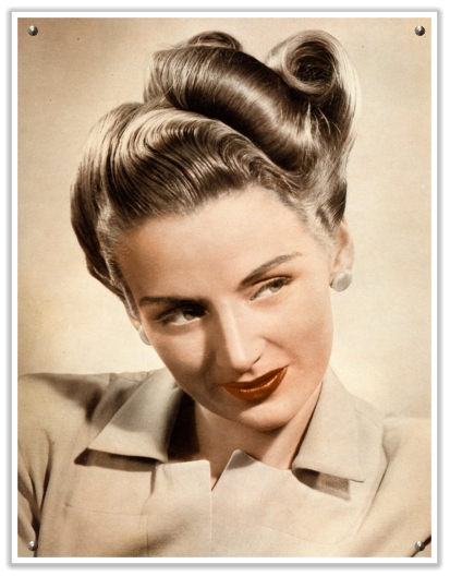 A 1940s vintage updo very elegant yet quite elaborate pinned curls form 