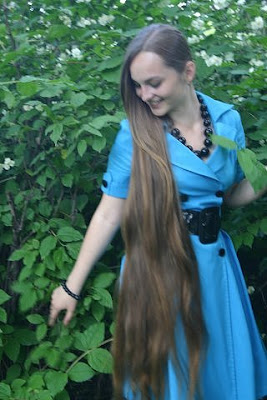 Amazing young woman with long hair, hair regrowth