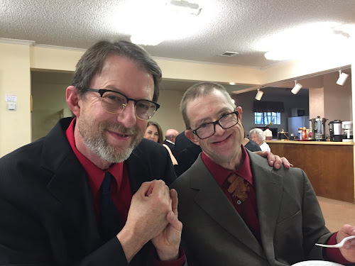 Dan and me at Dad's funeral, the last time I saw my little bro.