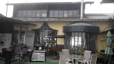 Open terrace with the tea bar & restaurant behind, Cochrane Place, Kurseong