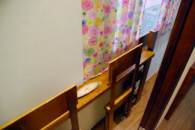 The Most Narrow House in the World Narrow House is one of the many ways that Austrian artist Erwin Wurm looks at the world differently and challenges his viewers to do the same. Wurm created this installation based off of his childhood home. Visitors were invited into the living quarters to explore the narrow spaces and slender furniture that filled the house. Everything including the hallways, the bedroom, the living areas, even the toilet, were unusually compressed. Through the installation, Wurm raises questions about space, posing "some deep and disturbing questions about the terror that comes from having our personal space constricted, restricted, or invaded."