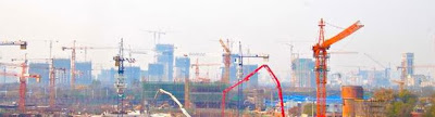 color photo of construction cranes in Shanghai, China