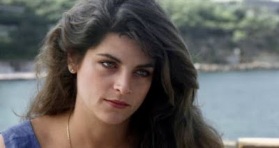 Claire, played by Kirstie Alley, looking concerned and fabulous with hypnotic eyes.