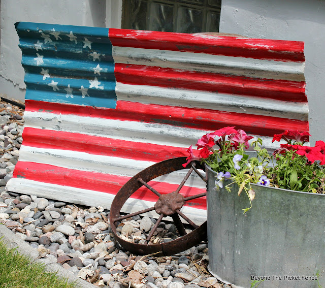 use old corrugated tin to make a flag