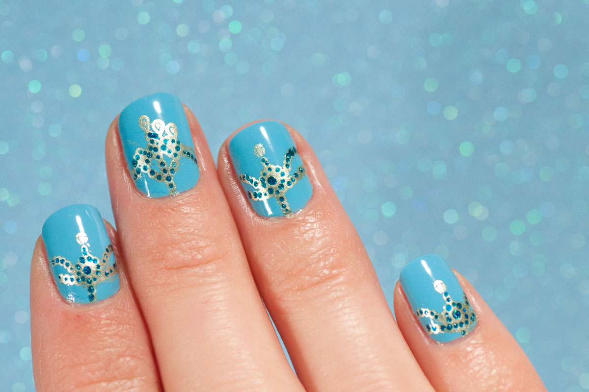 Blue Ornamental Nails stamped with MoYou London Explorer Plate 21