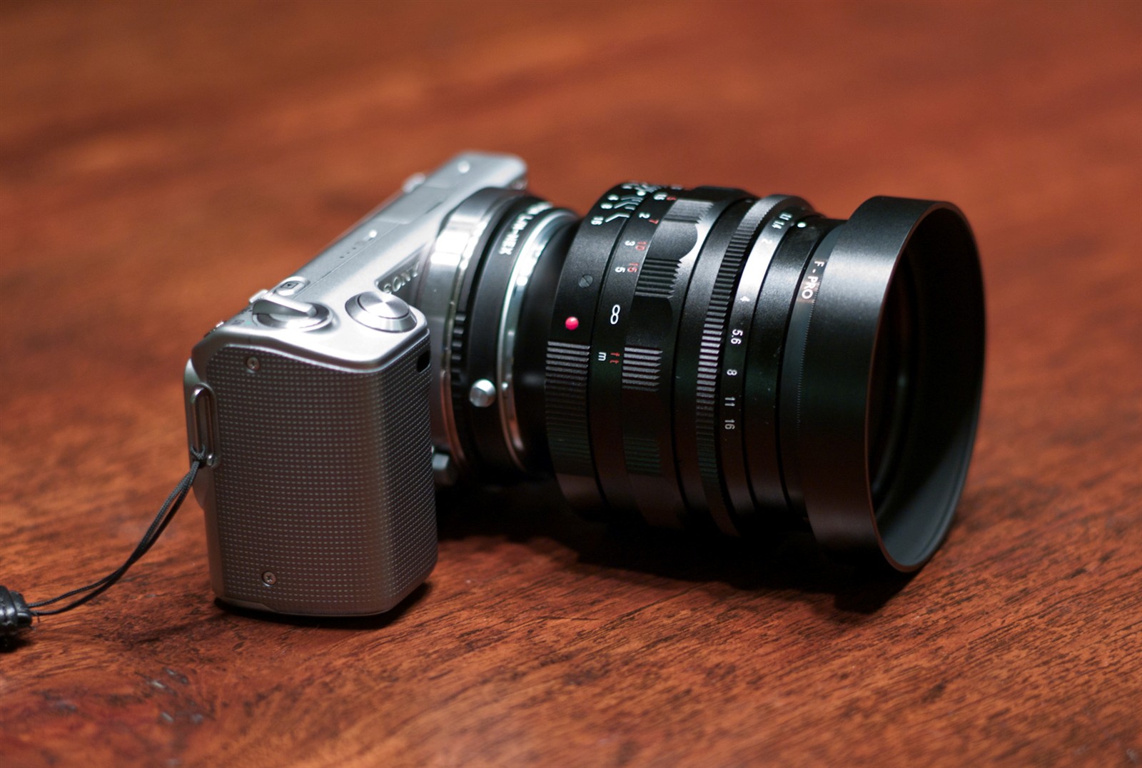 Sony NEX-5 with a Nokton vs a Leica M8 with a Summicron 50