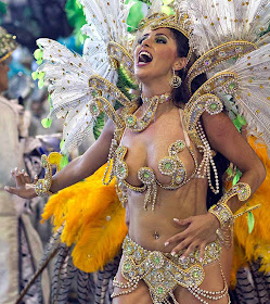 This school dancer do Peruche States, sings during a show before the carnival held in Sao Paulo, on March 4.