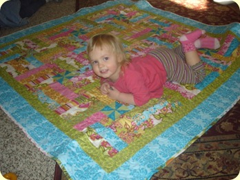 Sammie with her new quilt