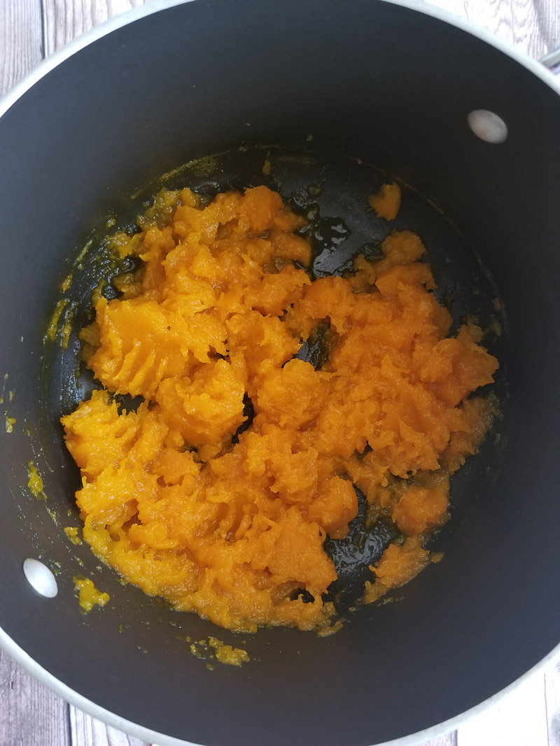 Picture of cooked pumpkin, slightly crushed to make punch.