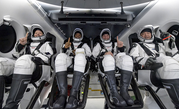 The Crew-1 astronauts take one last group photo aboard Resilience before disembarking from their capsule for the return trip back to Houston, Texas...on May 2, 2011.