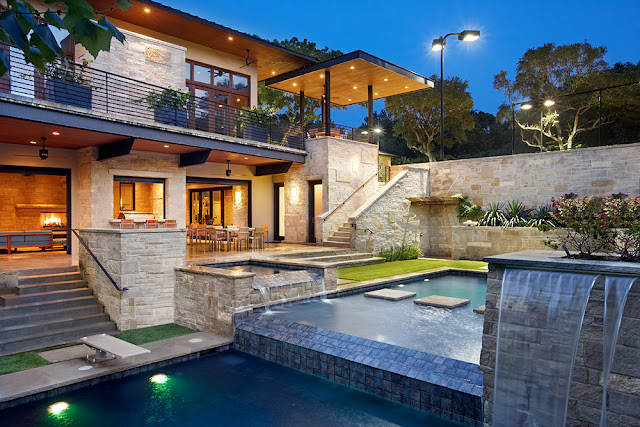 Picture of incredible pool elevations and fountains in front of the house
