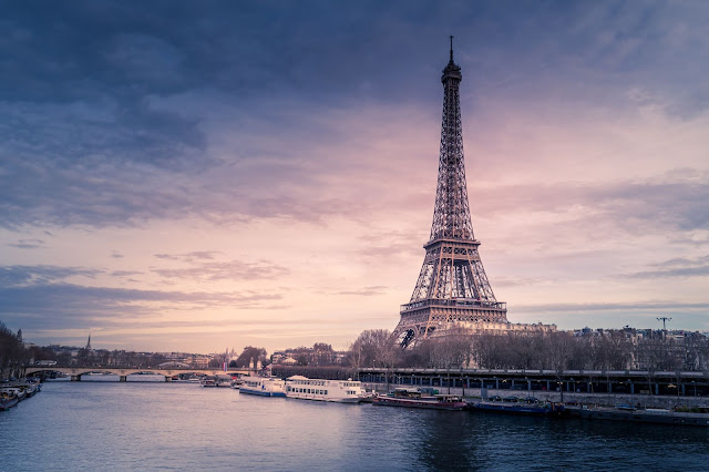 eiffel tower on river bank 