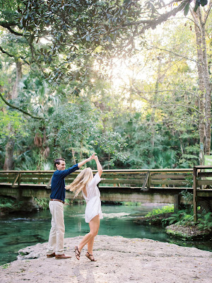 groom twirls bride