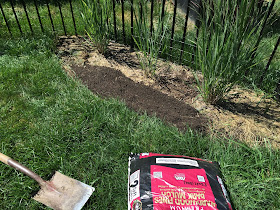 add top soil to mulch bed