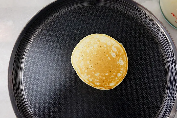 flipped pancake on pan