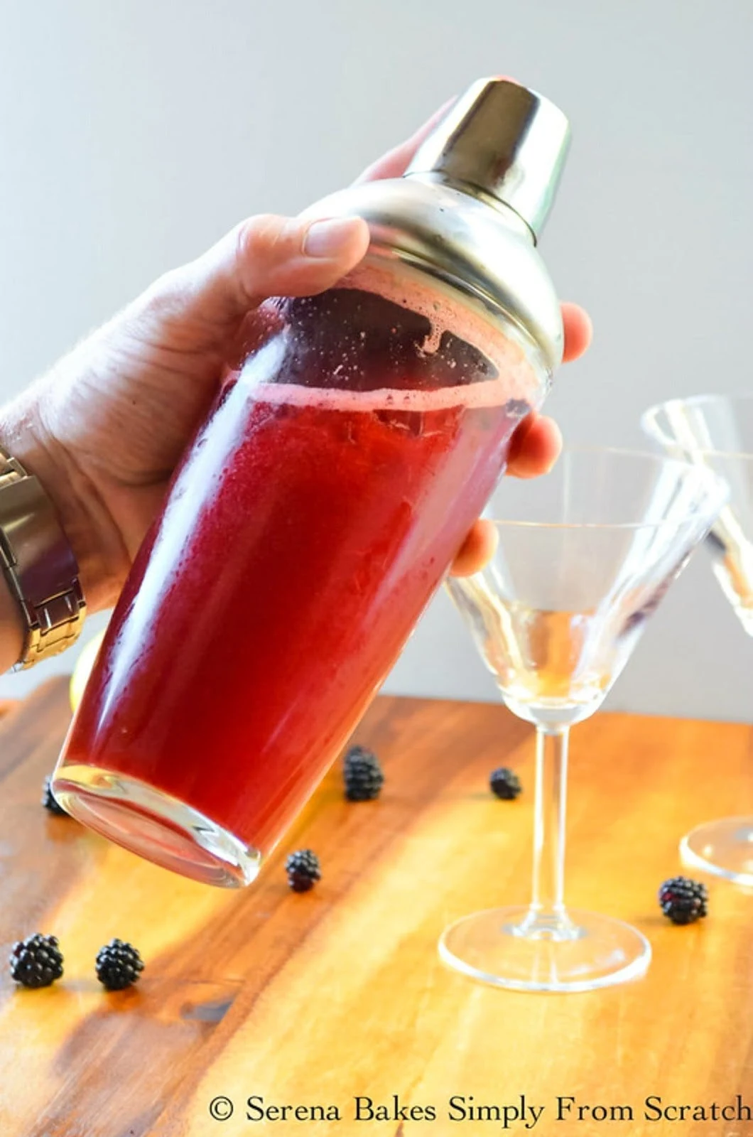 Spiked Blackberry Lemonade being shaken in a shaker jar.