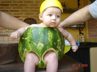 cute baby inside water melon skin