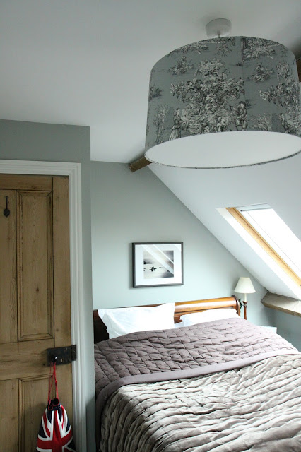 I love the beams in our attic bedroom, part of the original roof structure.