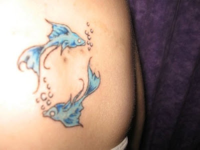 Posted by tattoo designs at 2:36 AM. Labels: PISCES STOMACH TATTOOS
