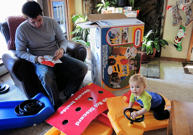 Nick and Carter assembling a Christmas present