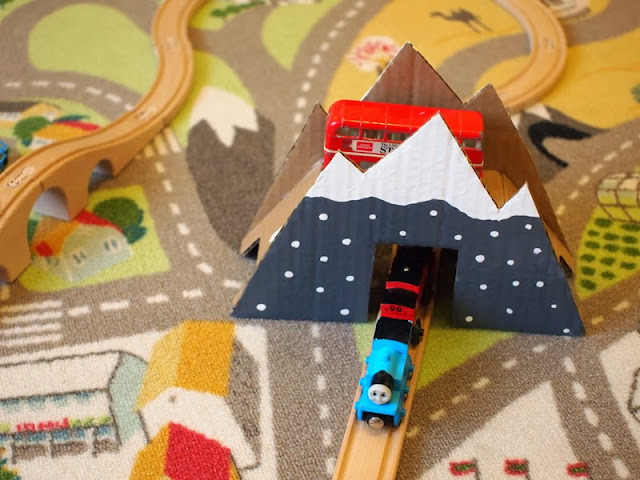 Using your DIY cardboard mountain bridge in play