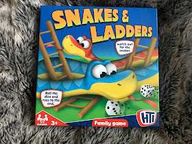 snakes and ladders board game in box 