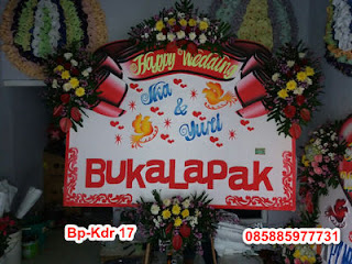 Toko karangan bunga di pare kediri menjual karangan bunga duka cita, belasungkawa, pernikahan atau wedding, selamat dan sukses, serah terima jabatan, promosi doktor, atau congratulation, handbouqet, bunga meja dan standing flower di pare kediri