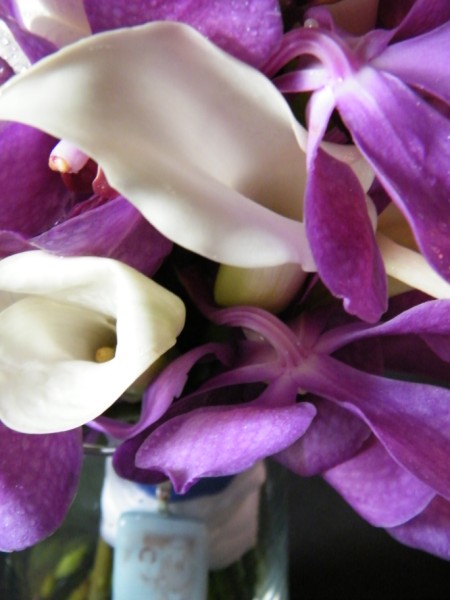 This bridal bouquet was made of purple Aranda Orchids white Calla Lilies