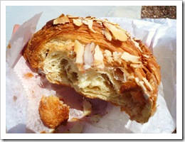 Half-bitten almond croissant 