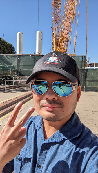 A selfie I took with space shuttle Endeavour's twin solid rocket motors at the California Science Center in Los Angeles...on November 8, 2023.