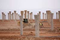 Workers build a thermosolar power plant at Noor II near the city of Ouarzazate, Morocco, November 4, 2016. (Credit: Reuters/Youssef Boudlal) Click to Enlarge.