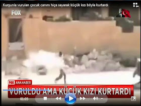 Suriyeli Çocuk Vuruldu, Yaralandı, Pes Etmedi askerlerin kurşun yağmuru altında küçük kızı ölümden kurtardı.