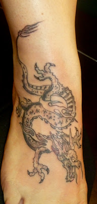 Dragon tattoo on foot