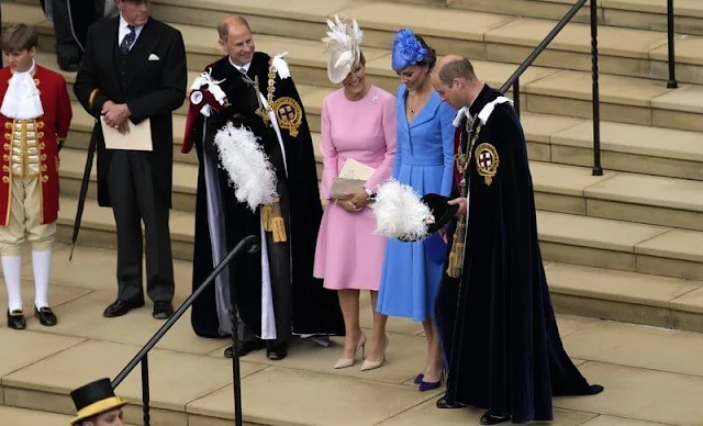 Kate Middleton wore a sky blue coat by Emilia Wickstead. The Countess of Wessex wore a baby pink bell-sleeve wool and silk blend dress