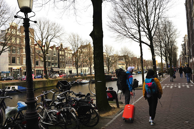 Amsterdam Visitors Carrying Luggage