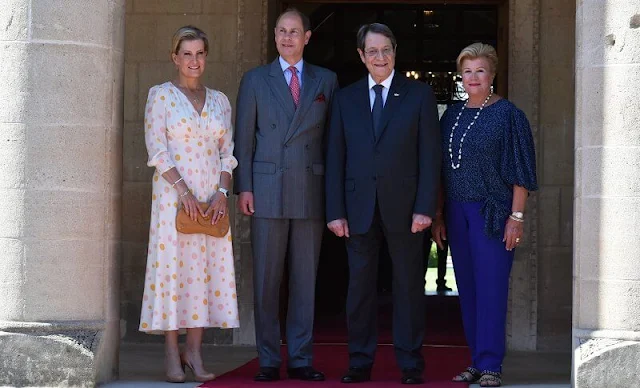 The Countess wore a beige amanda belted maxi dress by ARoss Girl x Soler, and cora polka-dot classic silk tea dress by Suzannah