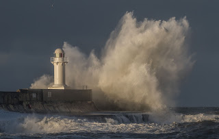 Lighthouse in Storm - photo by David Pye on Unsplash