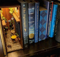 Manualidades decorativas en miniatura para bibliotecas fantásticas