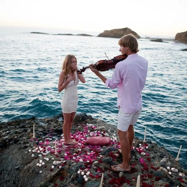 A violinist plays for his lover