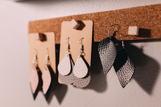 Three Sets of Leather Earrings on Display