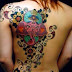 Women Full Back With Ball Ganesh Tattoo