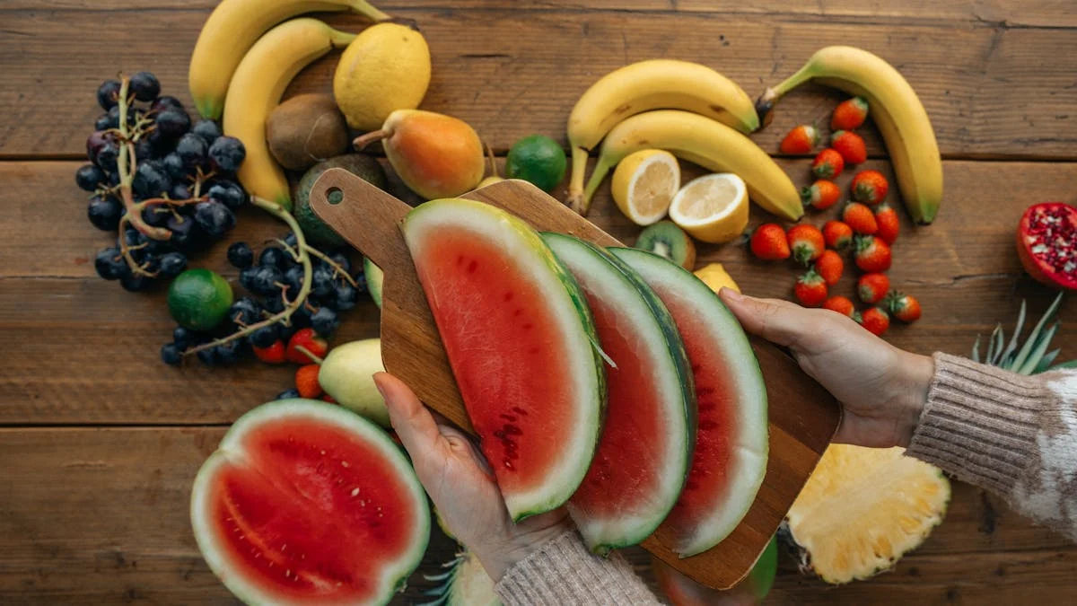 Person Holding Slices of Watermelon
