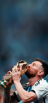 Messi holding world cup trophy
