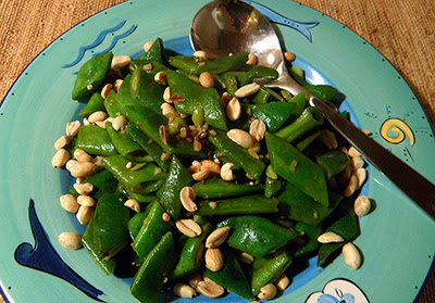 Garlic Ginger Bean Pods on Plate Sprinkled with Peanuts