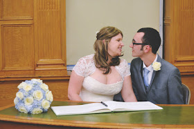 Signing the register wedding photo