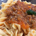 Fusilli Bolognese Bliss: A Pasta Tale of Savory Symphony