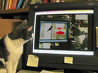 Spackle Puss (the cat) 36 (Watching Herself Watching a Hummingbird 2007)