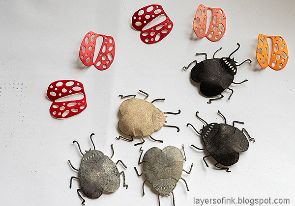Layers of ink - Ladybug Tag Tutorial by Anna-Karin Evaldsson. Shape with Tim Holtz Shaping Kit.