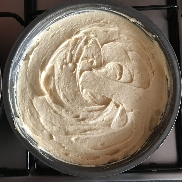 Cake mix in a round baking tin