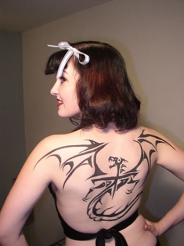 girl with dragon tattoo back. Black Dragon tattoo design in